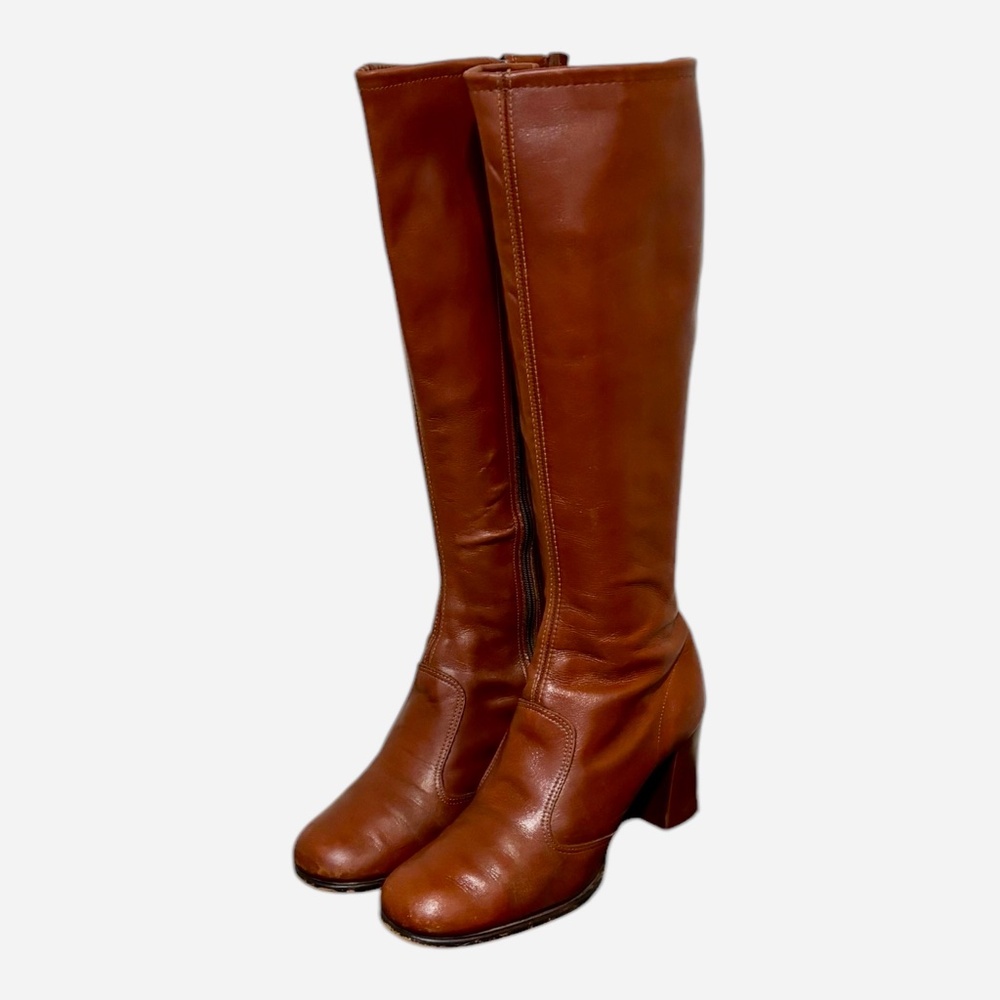 Size 7 Vintage tall rusk colored genuine leather women 1970s zip up Go Go Boots.